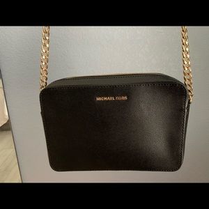 Black and gold Michael kors purse